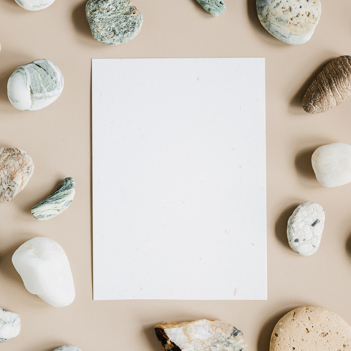 Paper surrounded by rocks